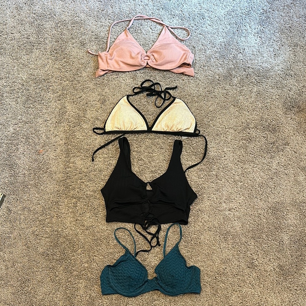 Set of Four woman’s swim tops Size Large